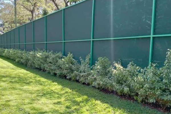 Modern screen fabric fence for clean outdoor boundary design